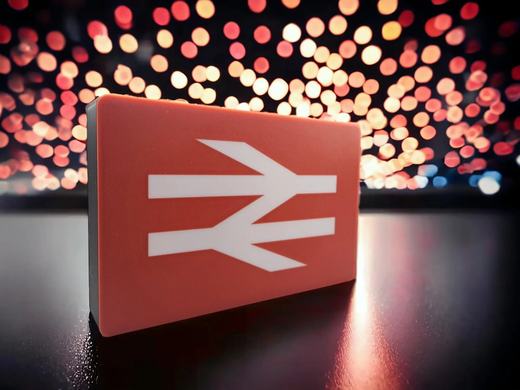 British Rail logo LED sign lit up in dark room