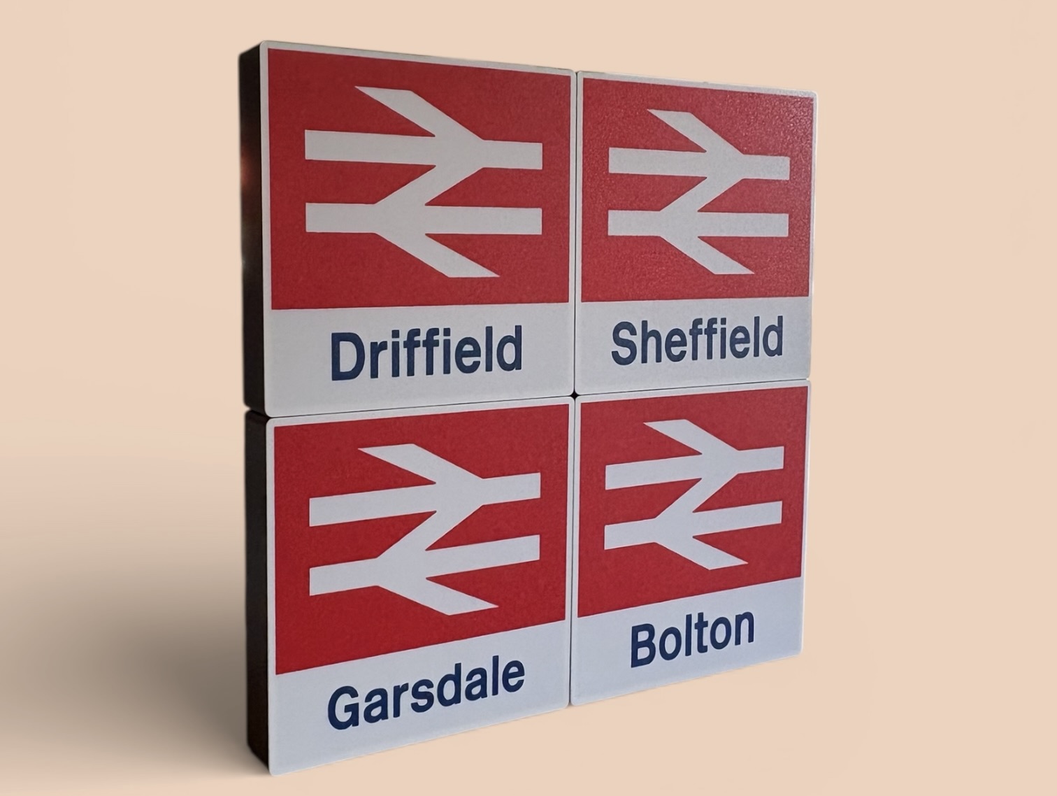 3D printed British Rail station signs with double arrow logo